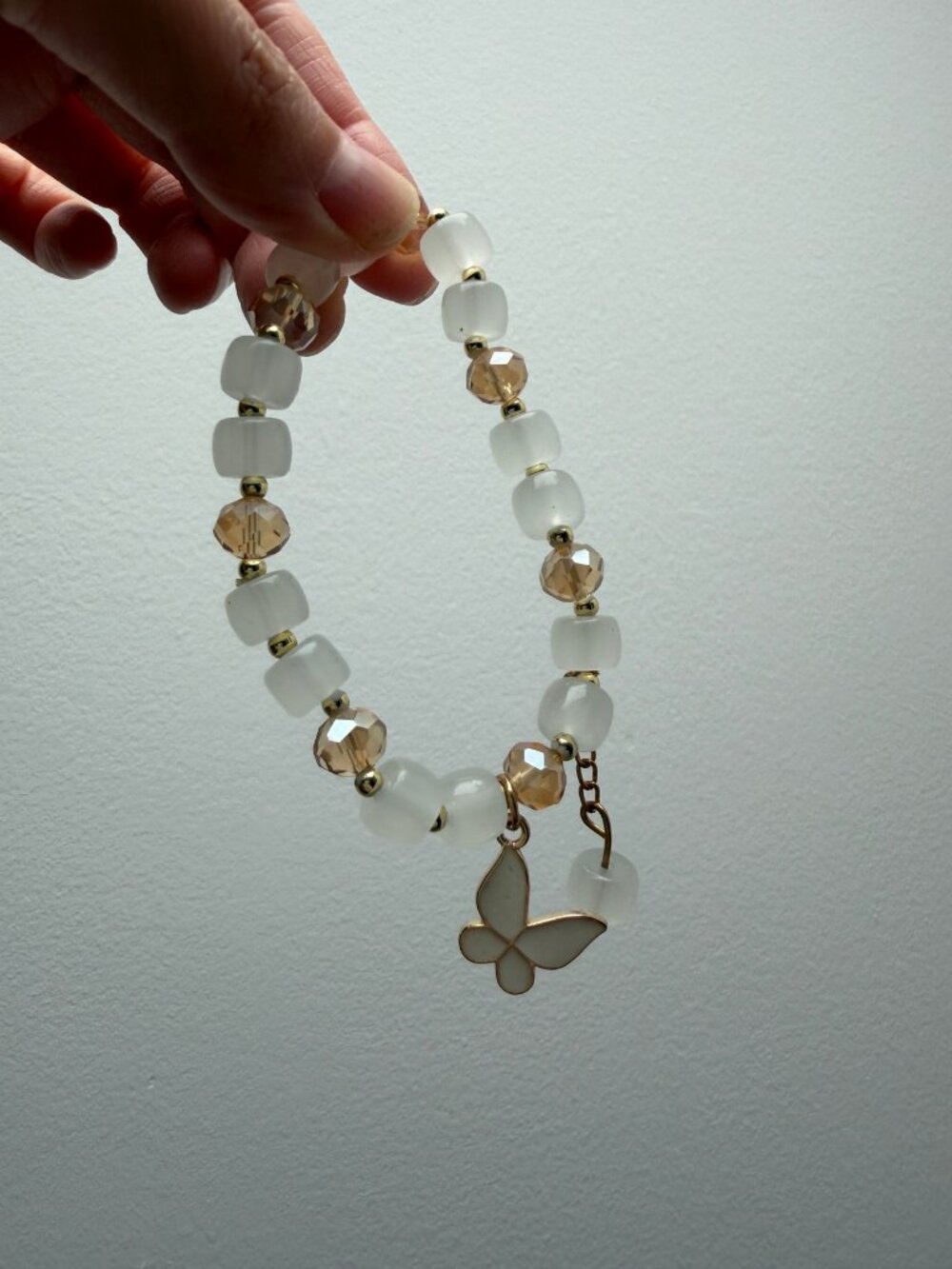 White Beaded Stretch Bracelet Butterfly Charm Gold Tone